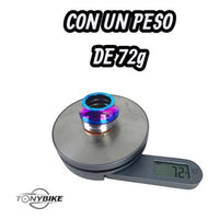 Juego de direccion integrado TONYBIKESGDL con acabado tornasol sobre una bascula digital marcando 72 gramos