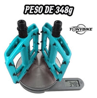 Pedales de plataforma TONYBIKESGDL color azul turquesa para BMX y MTB con pines de agarre sobre báscula digital