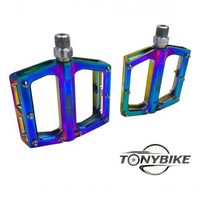 Pedales de plataforma TONYBIKESGDL con acabado tornasol oil slick, alta resistencia y pines de agarre para ciclismo.