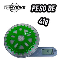 Plato de transmisión TONYBIKESGDL para BMX en aluminio verde ligero de 41 gramos sobre una báscula digital