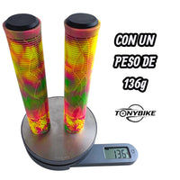 Puños TONYBIKESGDL para bicicleta con patrón geométrico multicolor, textura antideslizante y tapones negros de 136g.