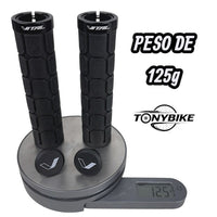 Puños TONYBIKESGDL para bicicleta en color negro con textura hexagonal antideslizante y tapones incluidos sobre báscula