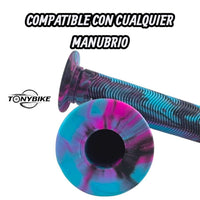 Puños de manubrio TONYBIKESGDL con diseño jaspeado en azul, rosa y negro, textura ergonómica para bicicleta.