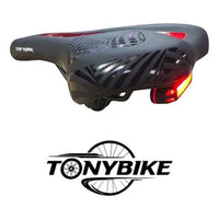 Sillín anatómico TONYBIKESGDL Top Rank negro con detalles rojos, acolchado de alta densidad y luz trasera integrada.