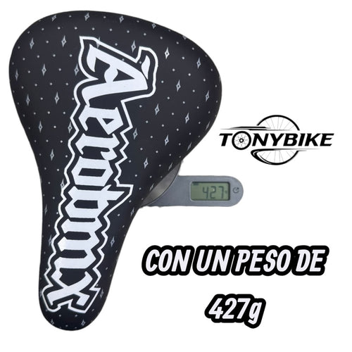 Sillín TONYBIKESGDL Aerobmx negro con patrón de diamantes y logotipo blanco, diseño ergonómico ligero de 427 gramos.